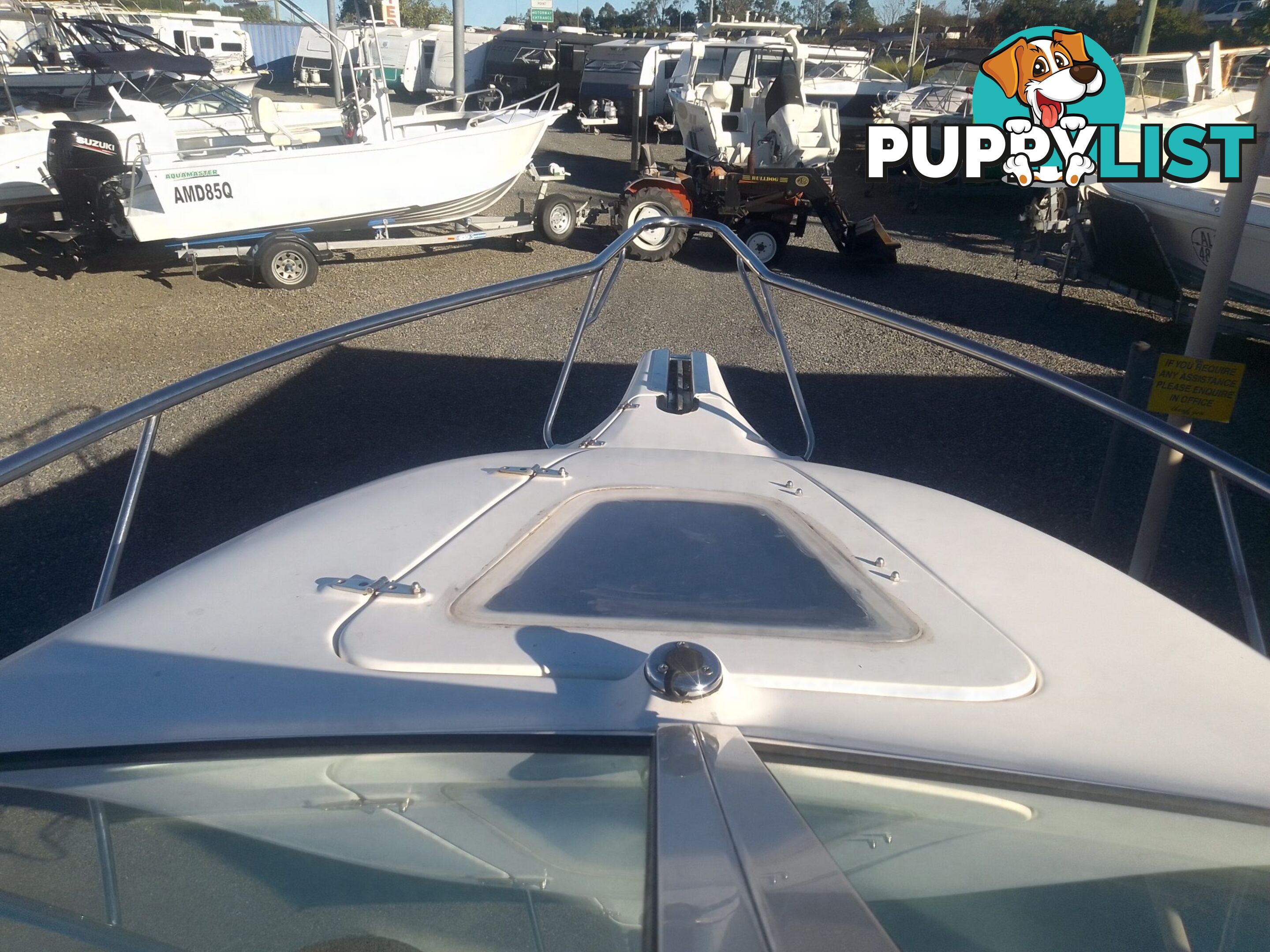 USED 2005 HAINES HUNTER 650 HORIZON HALF CABIN ON A 2005 EASYTOW DUAL AXLE TRAILER WITH A 215HP HONDA 4 STROKE OUTBOARD