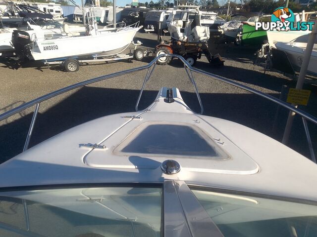 USED 2005 HAINES HUNTER 650 HORIZON HALF CABIN ON A 2005 EASYTOW DUAL AXLE TRAILER WITH A 215HP HONDA 4 STROKE OUTBOARD