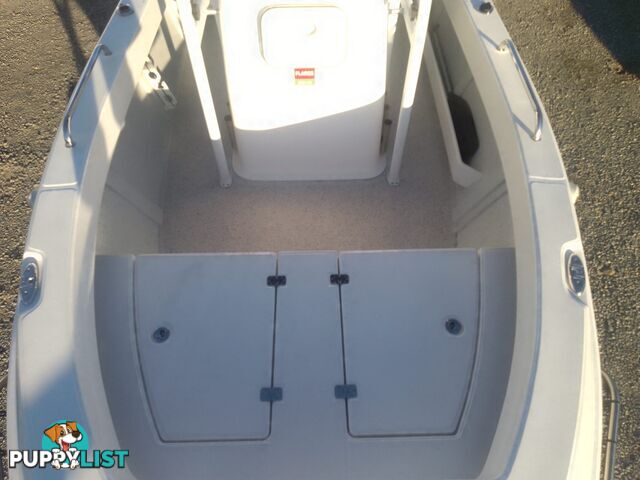 USED 2020 5M BONITO 500 CENTRE CONSOLE ON A 2020 MAYFAIR MARINE SINGLE AXLE TRAILER WITH A 2020 90HP MERCURY 4 STROKE OUTBOARD.
