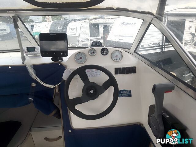 USED 2003 EAGLERAY 1800 SPORTS HALF CABIN WITH A 90HP SUZUKI 4 STROKE OUTBOARD ON A 2003 MODEL SPECIAL DUEL AXLE TRAILER