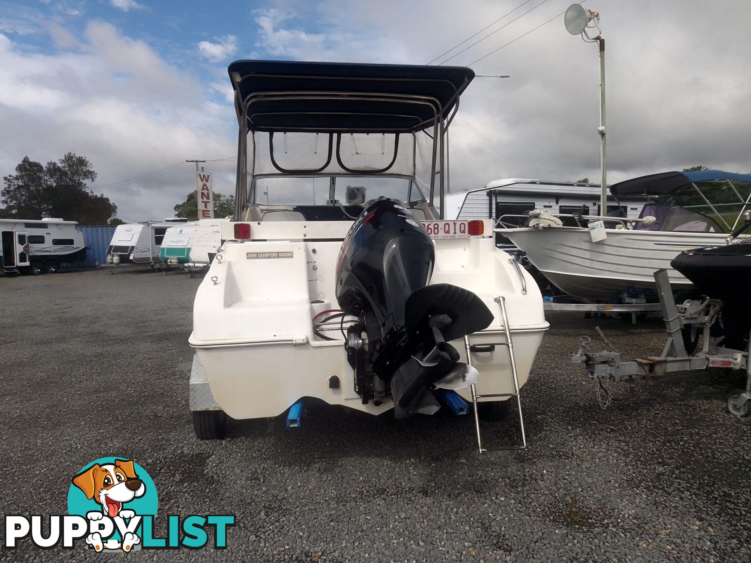 USED 2003 EAGLERAY 1800 SPORTS HALF CABIN WITH A 90HP SUZUKI 4 STROKE OUTBOARD ON A 2003 MODEL SPECIAL DUEL AXLE TRAILER