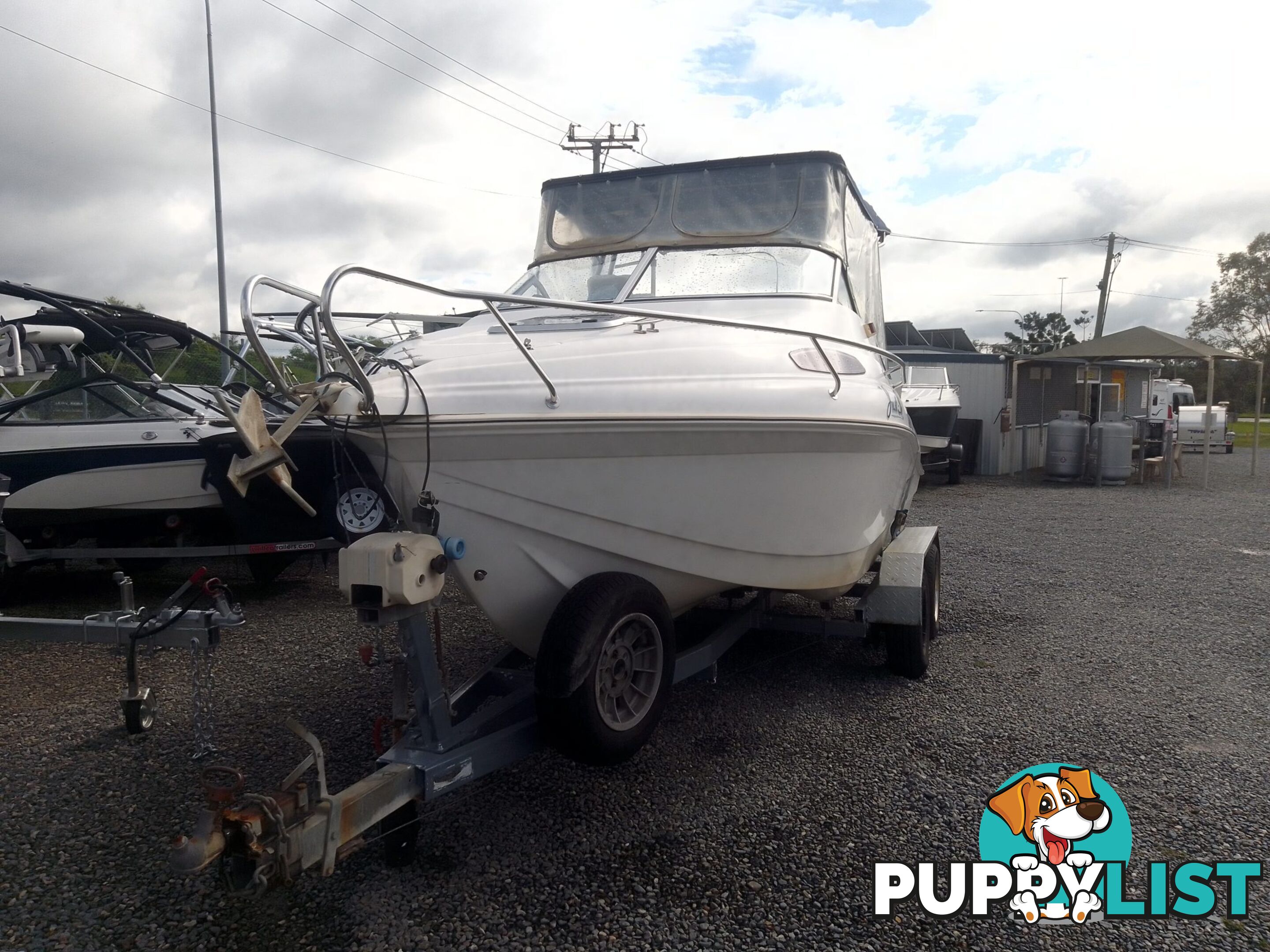 USED 2003 EAGLERAY 1800 SPORTS HALF CABIN WITH A 90HP SUZUKI 4 STROKE OUTBOARD ON A 2003 MODEL SPECIAL DUEL AXLE TRAILER