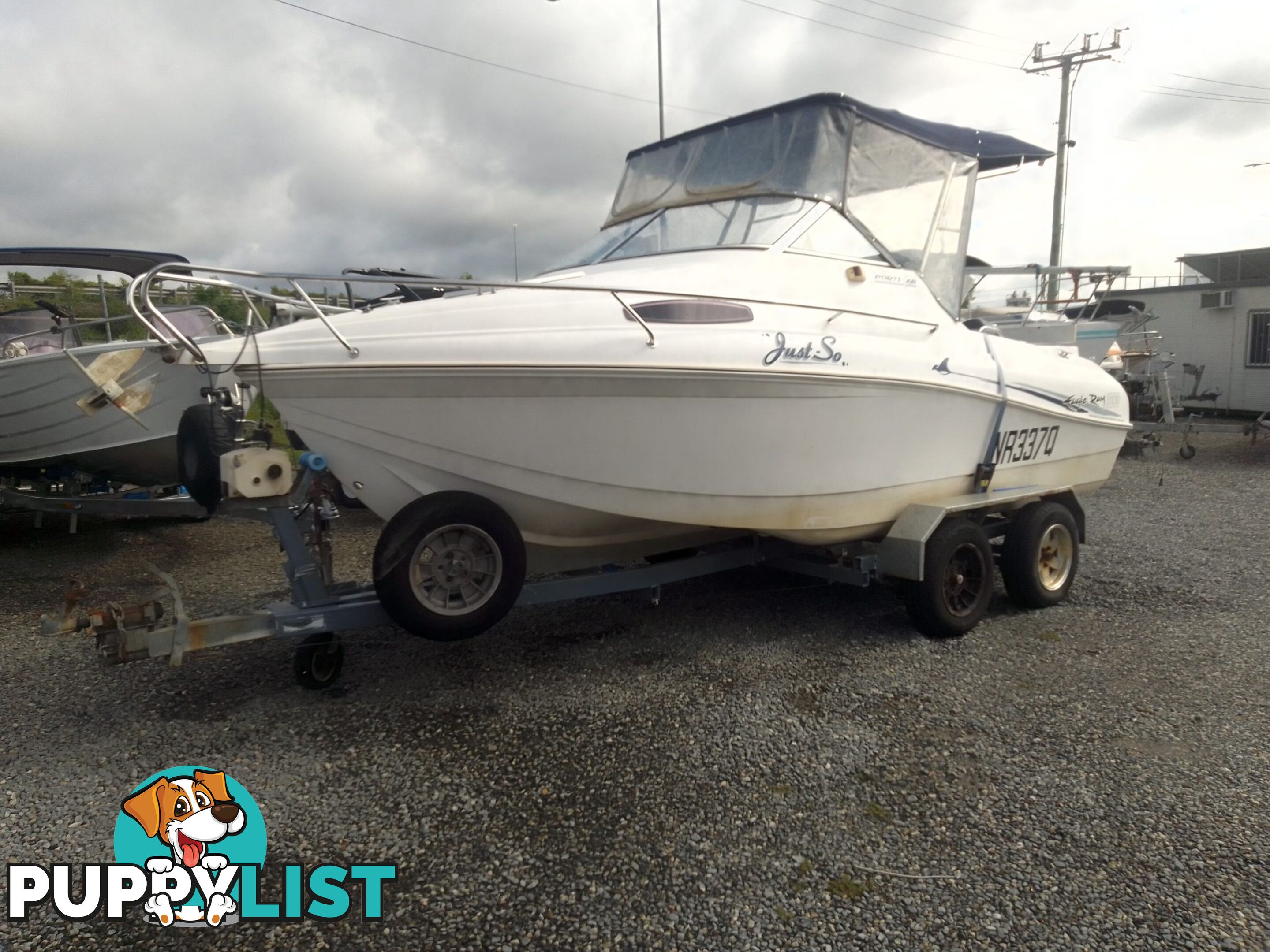 USED 2003 EAGLERAY 1800 SPORTS HALF CABIN WITH A 90HP SUZUKI 4 STROKE OUTBOARD ON A 2003 MODEL SPECIAL DUEL AXLE TRAILER