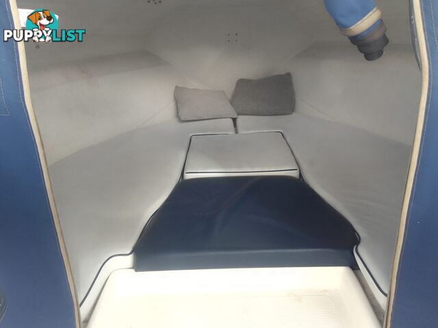 USED 2003 EAGLERAY 1800 SPORTS HALF CABIN WITH A 90HP SUZUKI 4 STROKE OUTBOARD ON A 2003 MODEL SPECIAL DUEL AXLE TRAILER