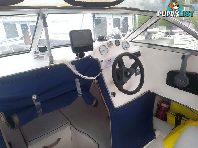 USED 2003 EAGLERAY 1800 SPORTS HALF CABIN WITH A 90HP SUZUKI 4 STROKE OUTBOARD ON A 2003 MODEL SPECIAL DUEL AXLE TRAILER