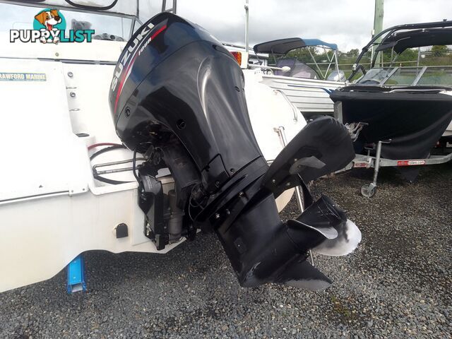 USED 2003 EAGLERAY 1800 SPORTS HALF CABIN WITH A 90HP SUZUKI 4 STROKE OUTBOARD ON A 2003 MODEL SPECIAL DUEL AXLE TRAILER