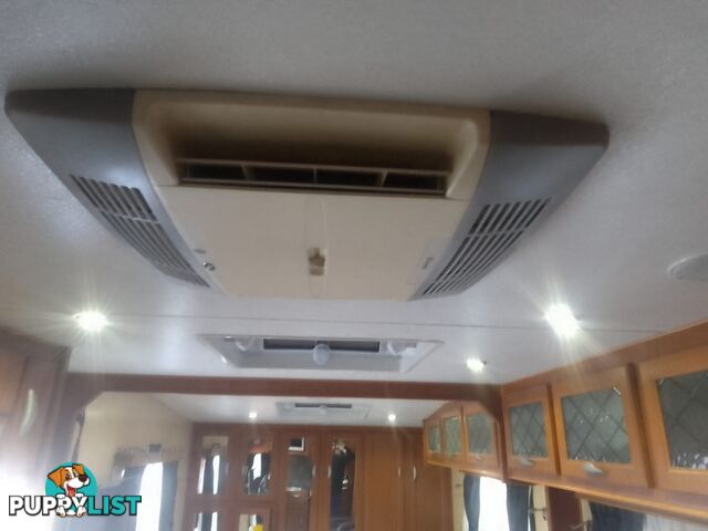 USED 2012 CRUSADER MANHATTAN 24'DUAL AXLE TOURING CARAVAN