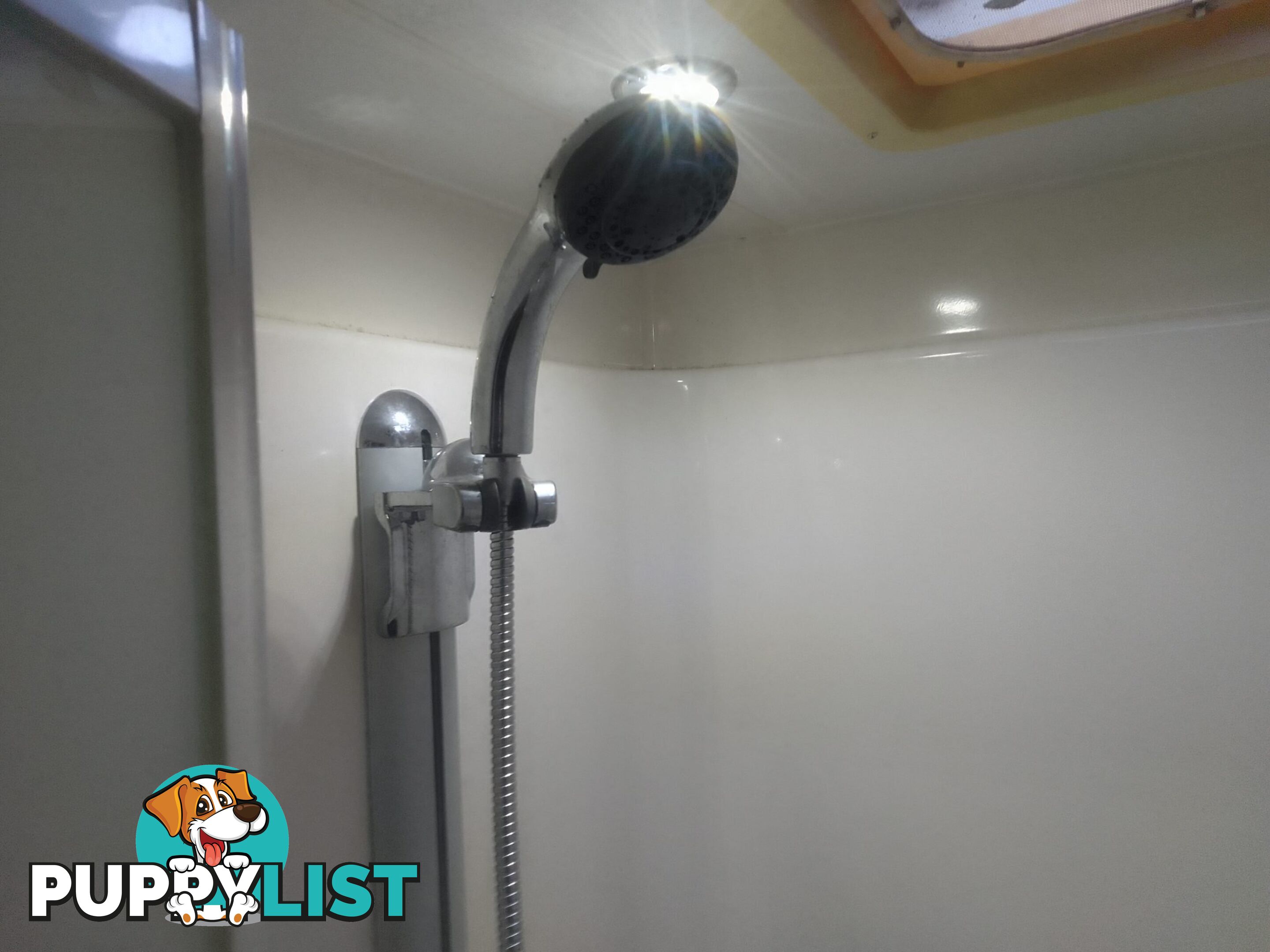 USED 2012 CRUSADER MANHATTAN 24'DUAL AXLE TOURING CARAVAN