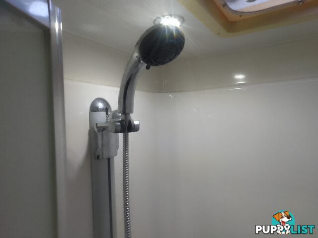 USED 2012 CRUSADER MANHATTAN 24'DUAL AXLE TOURING CARAVAN