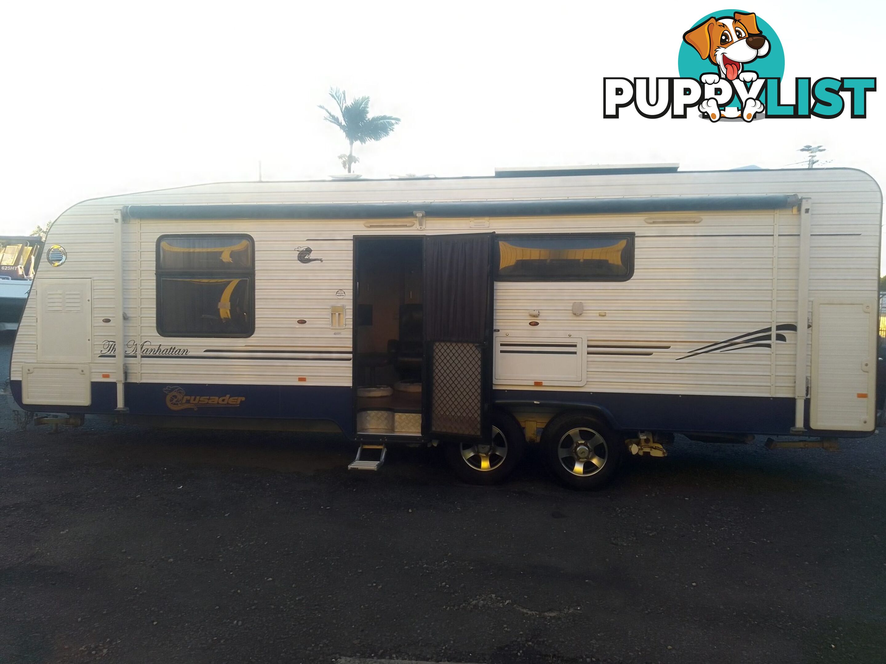 USED 2012 CRUSADER MANHATTAN 24'DUAL AXLE TOURING CARAVAN