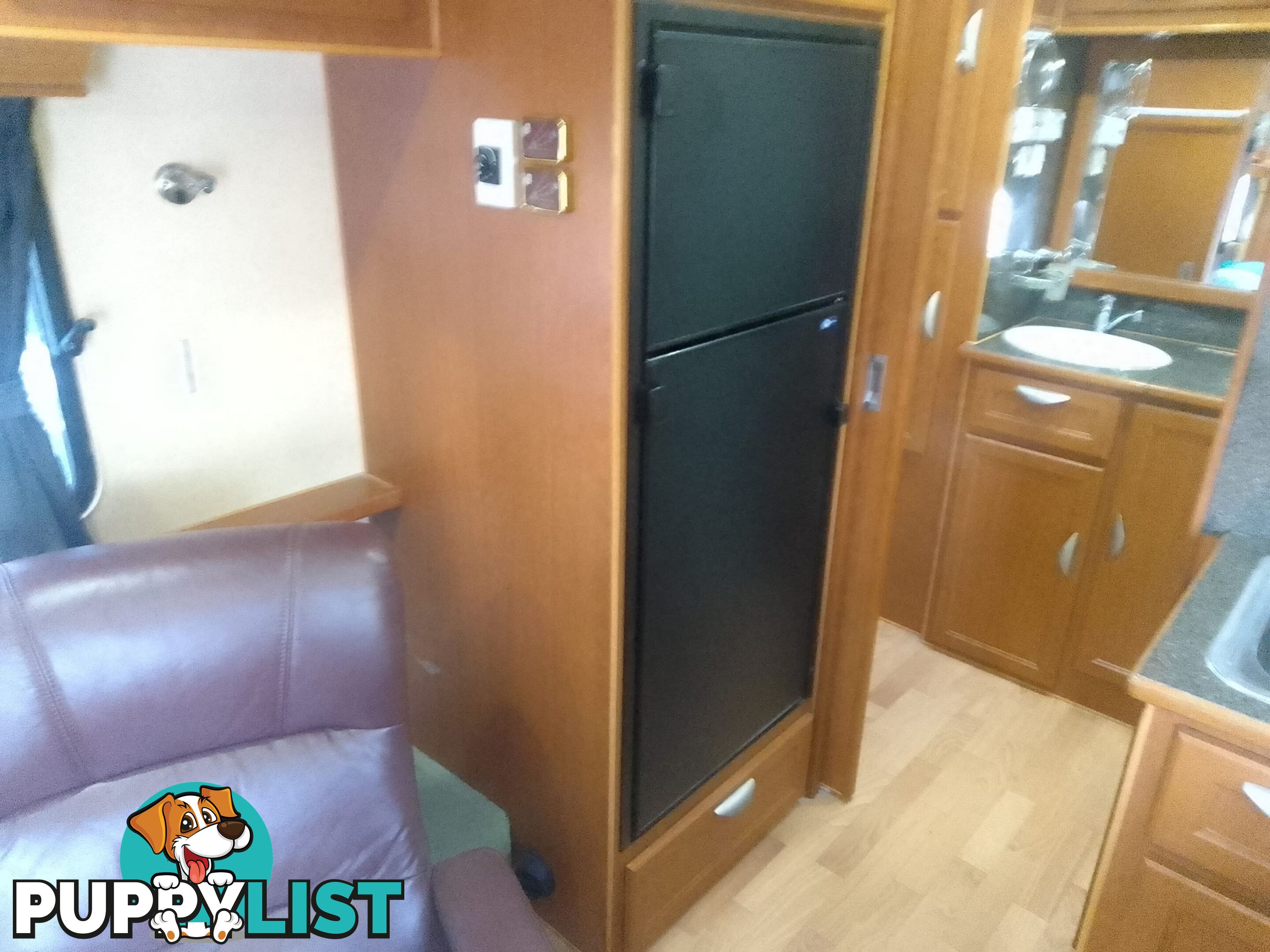 USED 2012 CRUSADER MANHATTAN 24'DUAL AXLE TOURING CARAVAN