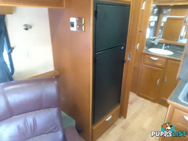 USED 2012 CRUSADER MANHATTAN 24'DUAL AXLE TOURING CARAVAN
