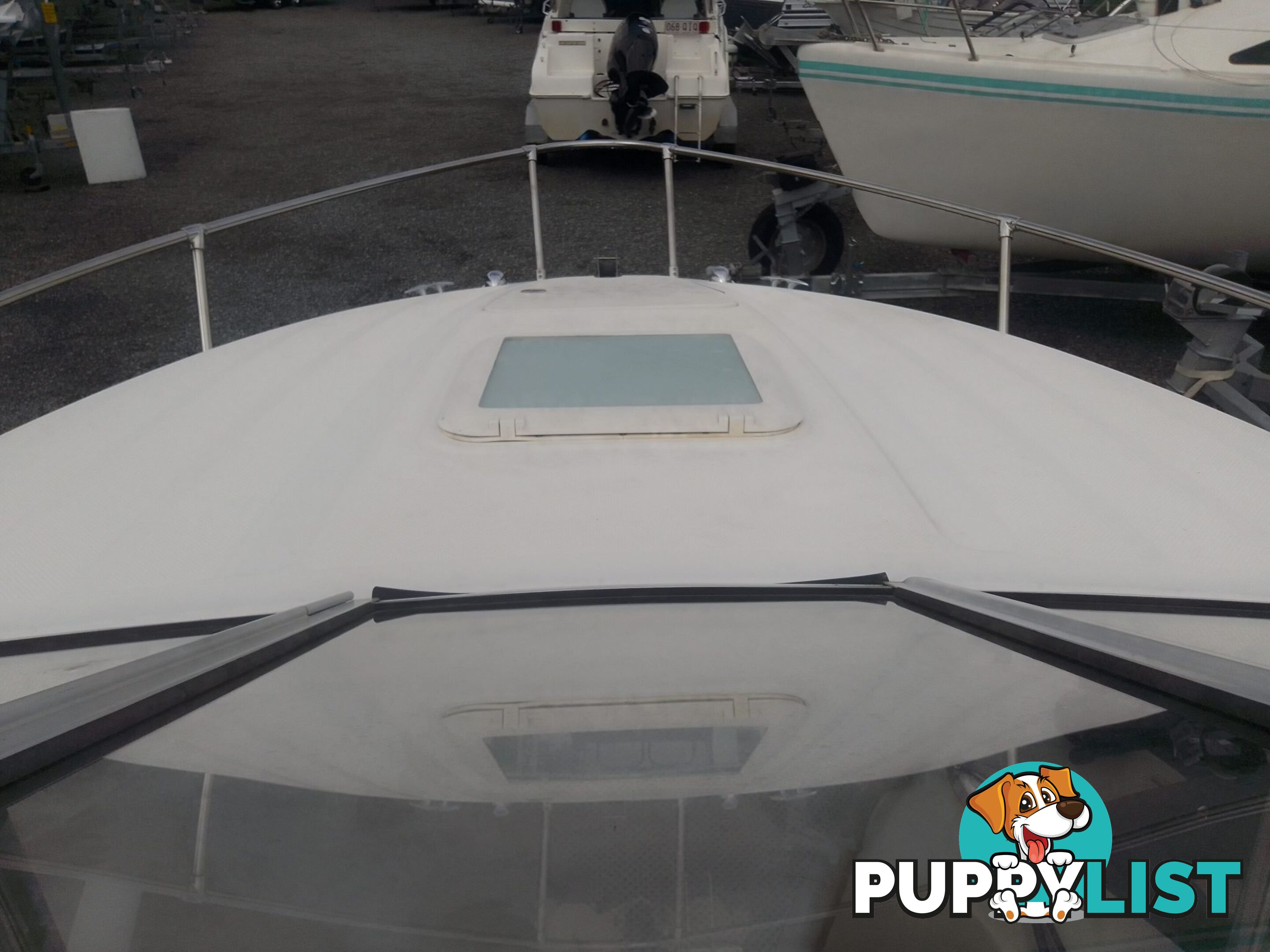 USED 2006 BAYLINER DISCOVERY CUDDY CABIN WITH A FOUR CYLINDER 135HP MERCRUISER ON A KARAVAN SINGLE AXLE TRAILER