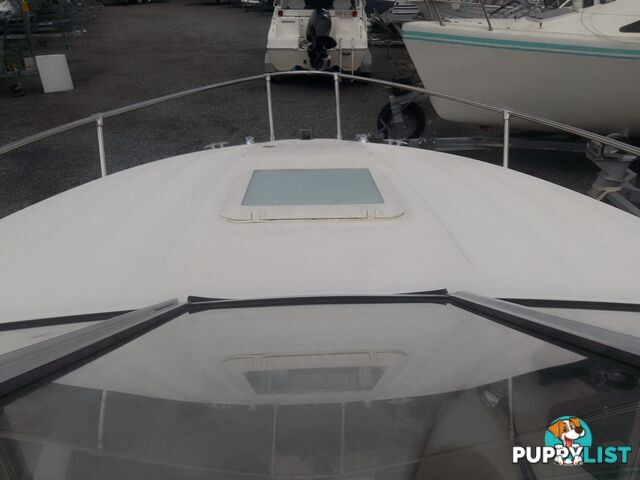 USED 2006 BAYLINER DISCOVERY CUDDY CABIN WITH A FOUR CYLINDER 135HP MERCRUISER ON A KARAVAN SINGLE AXLE TRAILER