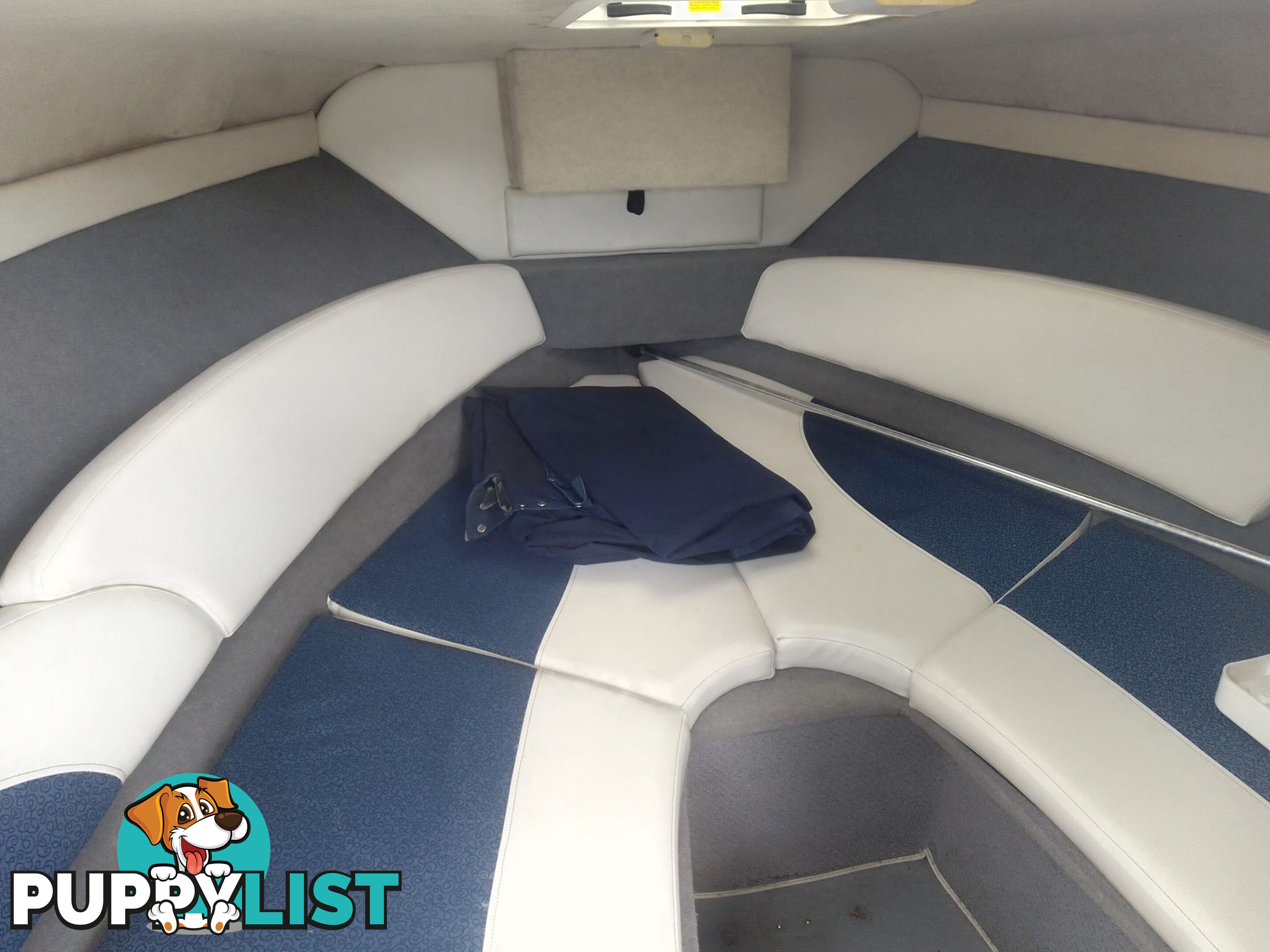 USED 2006 BAYLINER DISCOVERY CUDDY CABIN WITH A FOUR CYLINDER 135HP MERCRUISER ON A KARAVAN SINGLE AXLE TRAILER