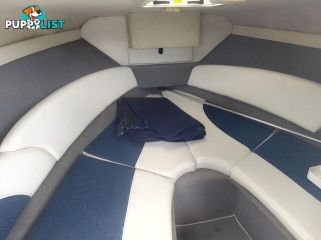 USED 2006 BAYLINER DISCOVERY CUDDY CABIN WITH A FOUR CYLINDER 135HP MERCRUISER ON A KARAVAN SINGLE AXLE TRAILER