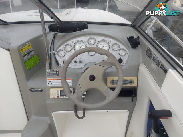 USED 2006 BAYLINER DISCOVERY CUDDY CABIN WITH A FOUR CYLINDER 135HP MERCRUISER ON A KARAVAN SINGLE AXLE TRAILER