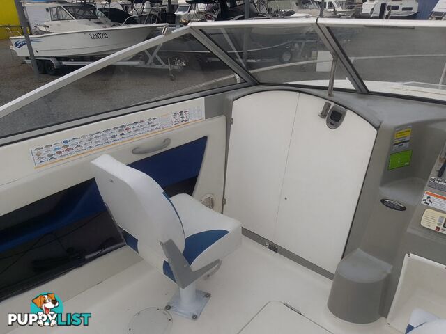 USED 2006 BAYLINER DISCOVERY CUDDY CABIN WITH A FOUR CYLINDER 135HP MERCRUISER ON A KARAVAN SINGLE AXLE TRAILER