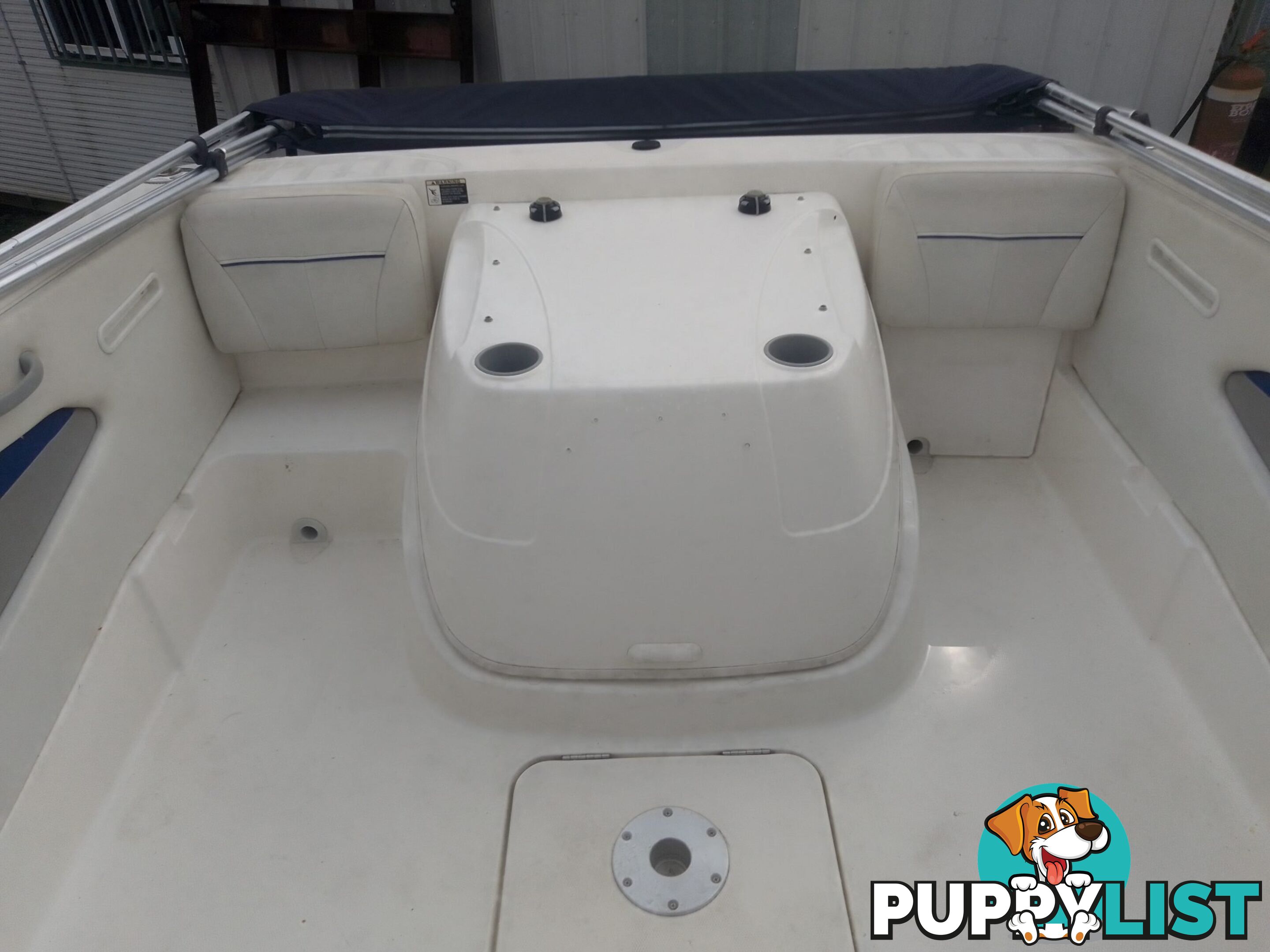 USED 2006 BAYLINER DISCOVERY CUDDY CABIN WITH A FOUR CYLINDER 135HP MERCRUISER ON A KARAVAN SINGLE AXLE TRAILER