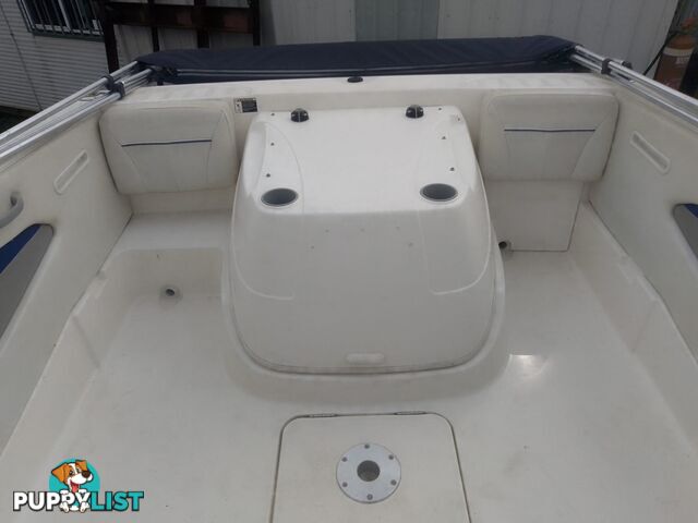 USED 2006 BAYLINER DISCOVERY CUDDY CABIN WITH A FOUR CYLINDER 135HP MERCRUISER ON A KARAVAN SINGLE AXLE TRAILER