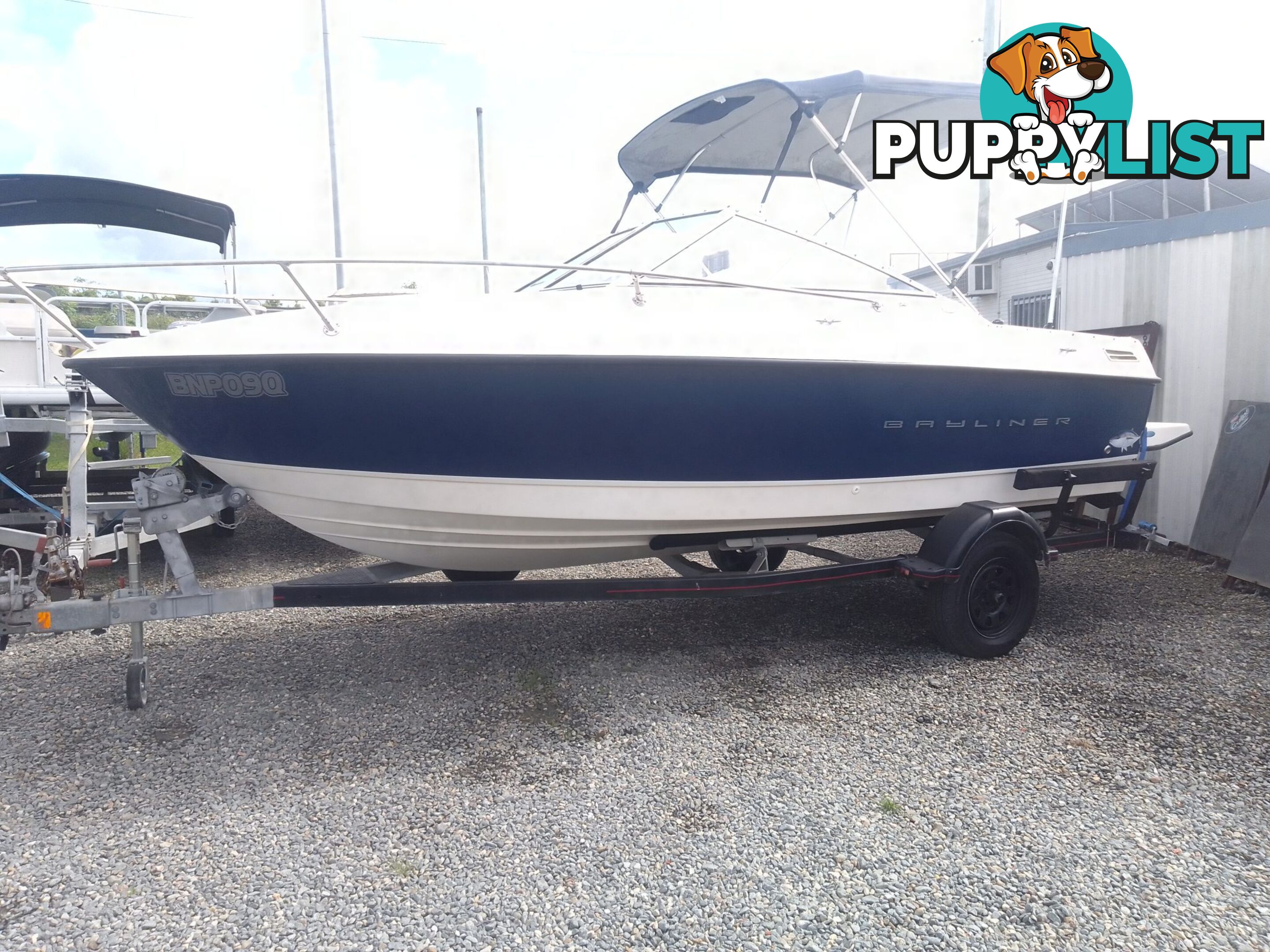 USED 2006 BAYLINER DISCOVERY CUDDY CABIN WITH A FOUR CYLINDER 135HP MERCRUISER ON A KARAVAN SINGLE AXLE TRAILER