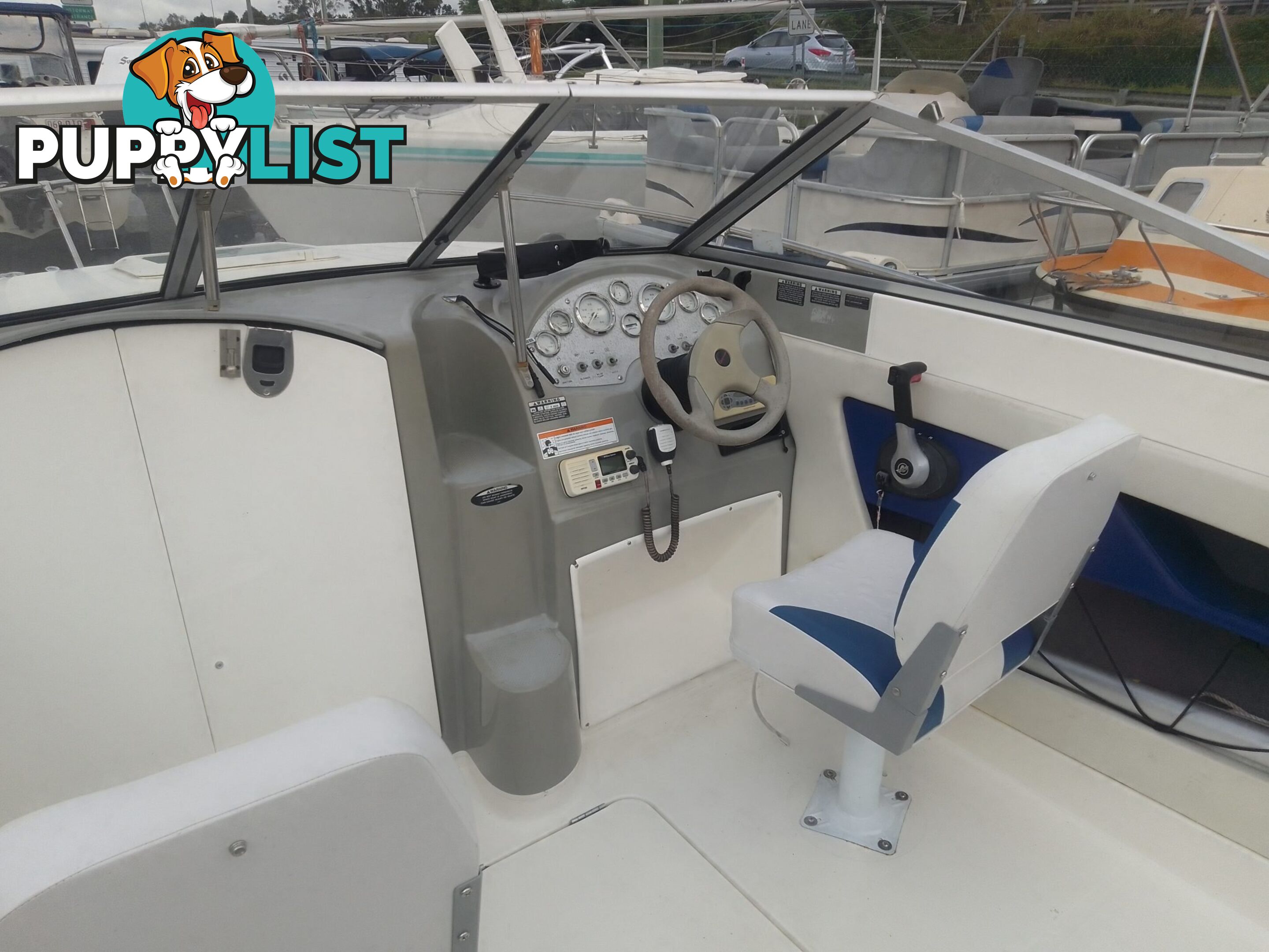 USED 2006 BAYLINER DISCOVERY CUDDY CABIN WITH A FOUR CYLINDER 135HP MERCRUISER ON A KARAVAN SINGLE AXLE TRAILER