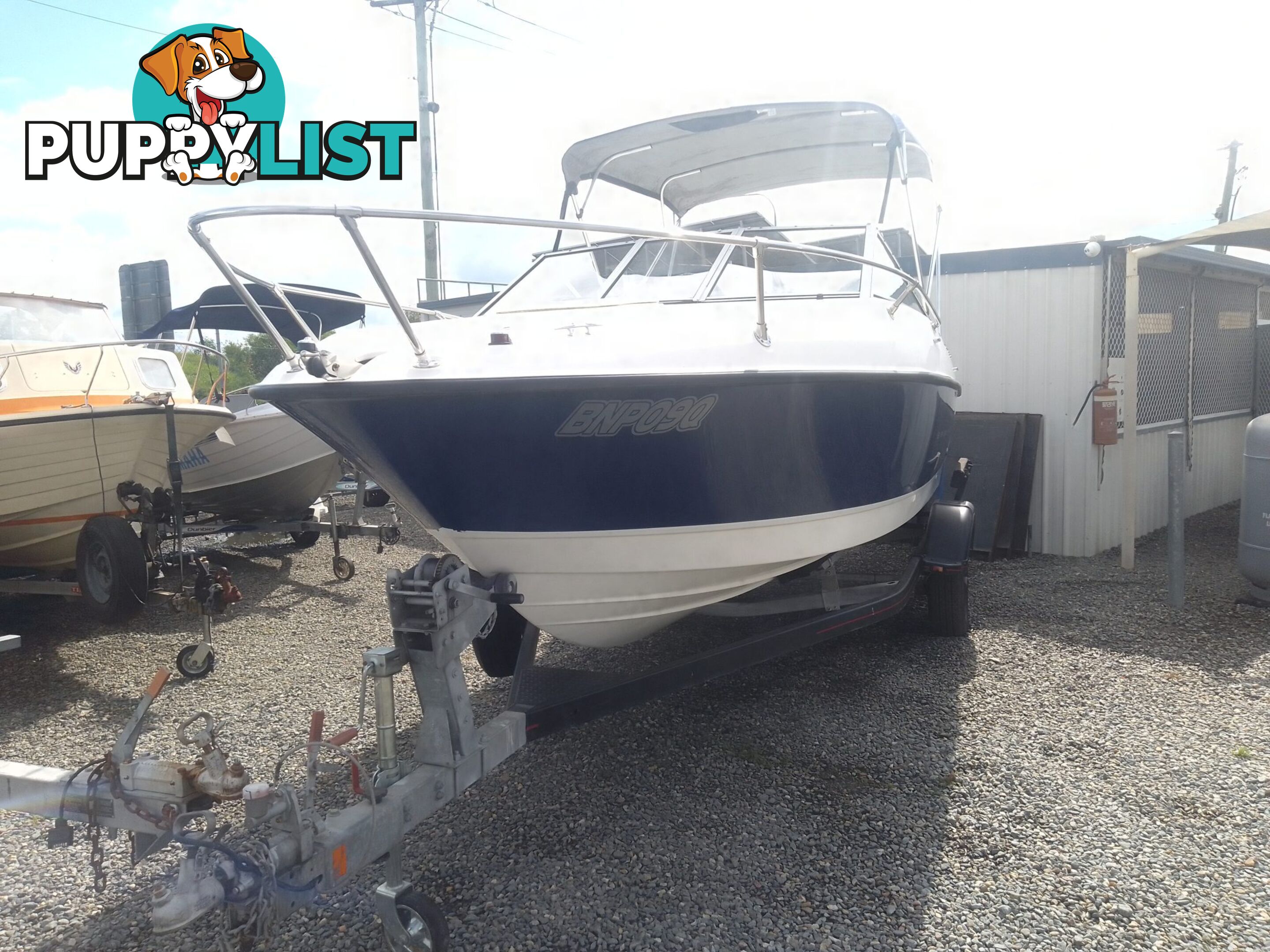 USED 2006 BAYLINER DISCOVERY CUDDY CABIN WITH A FOUR CYLINDER 135HP MERCRUISER ON A KARAVAN SINGLE AXLE TRAILER