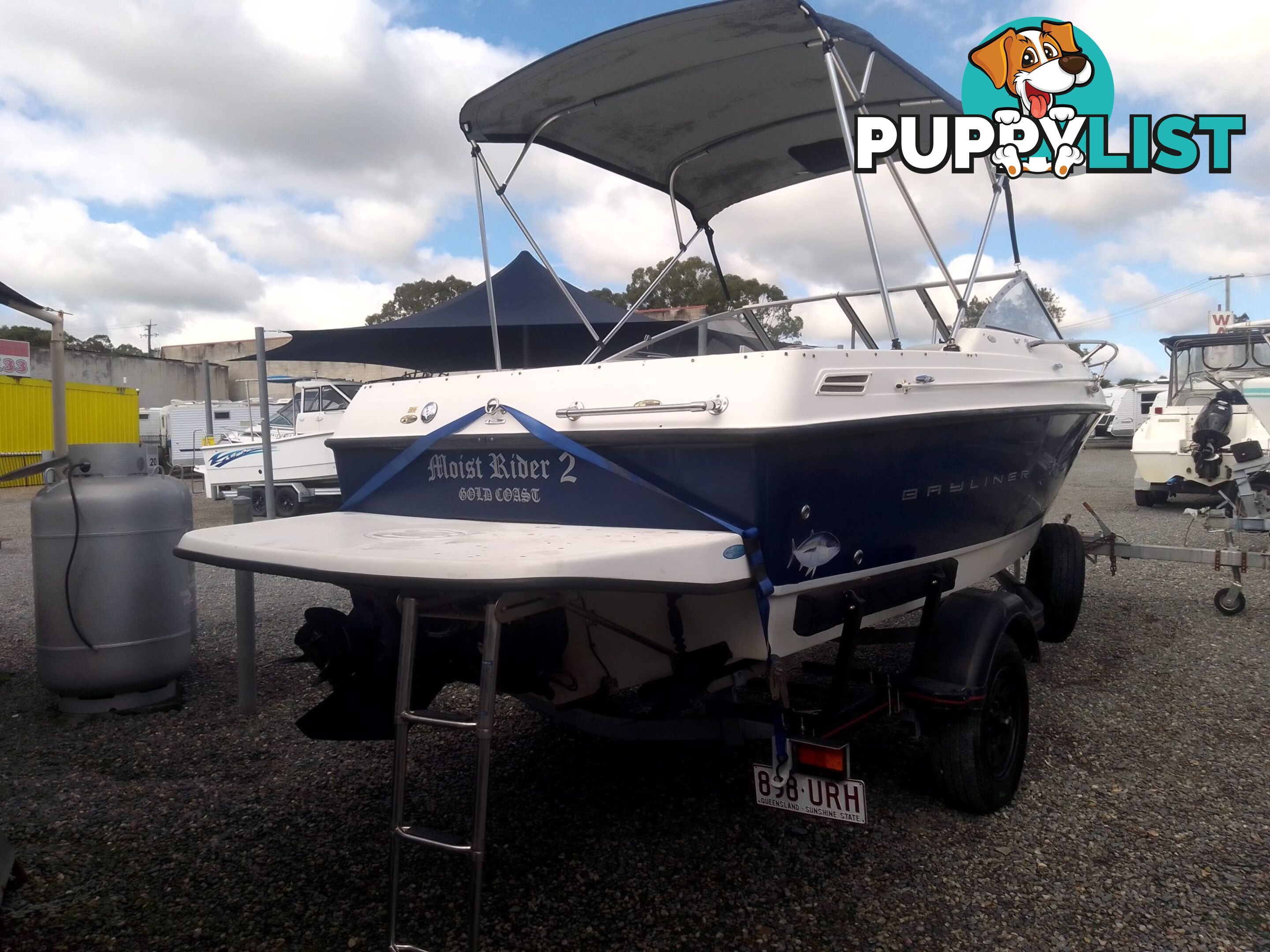 USED 2006 BAYLINER DISCOVERY CUDDY CABIN WITH A FOUR CYLINDER 135HP MERCRUISER ON A KARAVAN SINGLE AXLE TRAILER