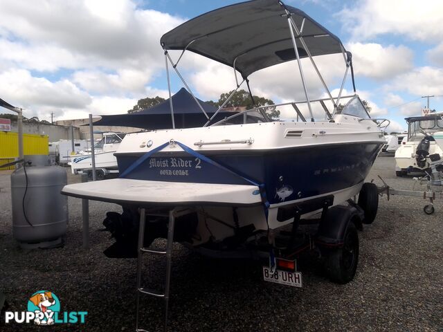 USED 2006 BAYLINER DISCOVERY CUDDY CABIN WITH A FOUR CYLINDER 135HP MERCRUISER ON A KARAVAN SINGLE AXLE TRAILER