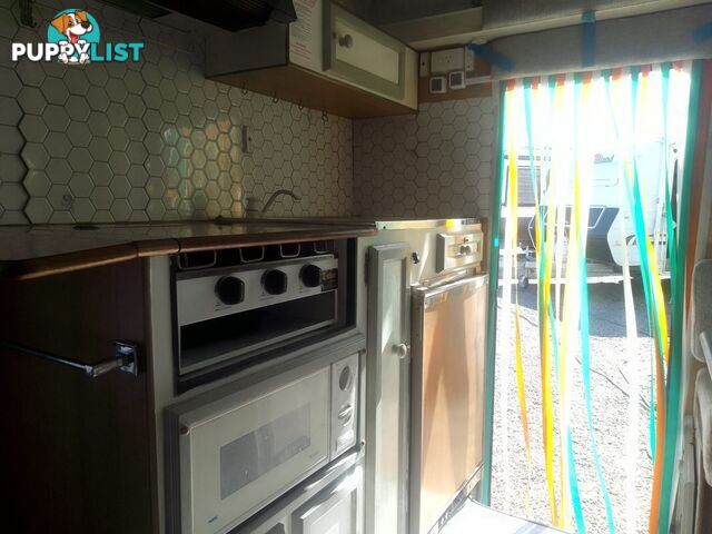 USED 1996 REGAL MINI SERIES 12' SINGLE AXLE, POP TOP CARAVAN