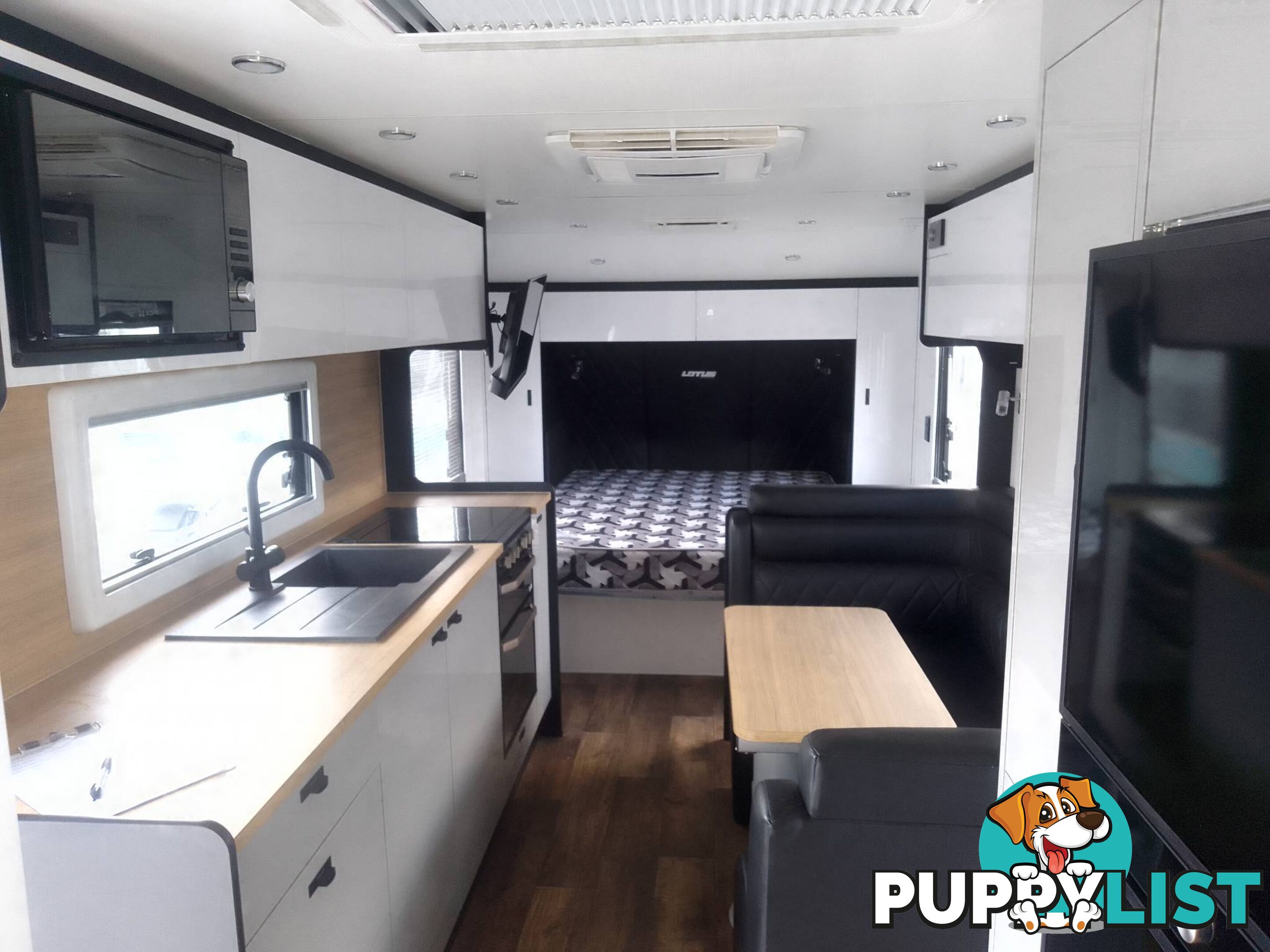 USED 2022 LOTUS FREELANDER 216 OFFROAD CARAVAN WITH WISHBONE, COIL & SHOCK ABSORBER SUSPENSION.