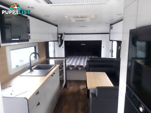 USED 2022 LOTUS FREELANDER 216 OFFROAD CARAVAN WITH WISHBONE, COIL & SHOCK ABSORBER SUSPENSION.
