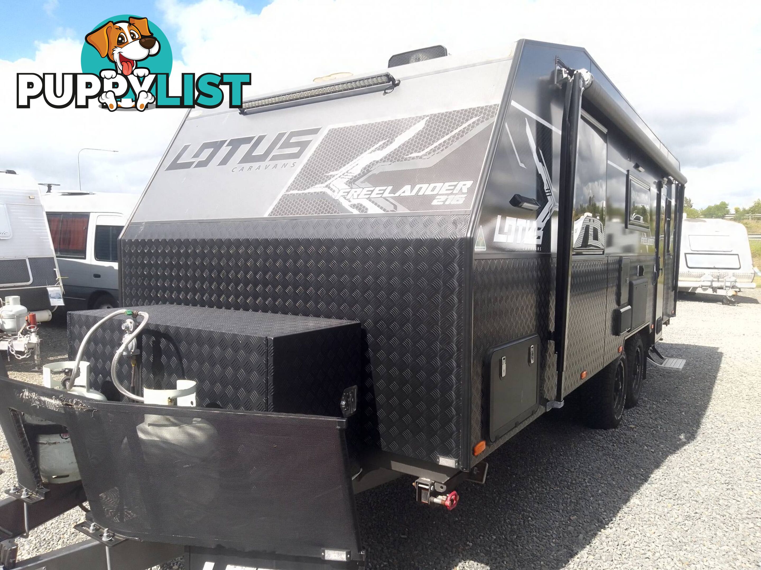 USED 2022 LOTUS FREELANDER 216 OFFROAD CARAVAN WITH WISHBONE, COIL & SHOCK ABSORBER SUSPENSION.