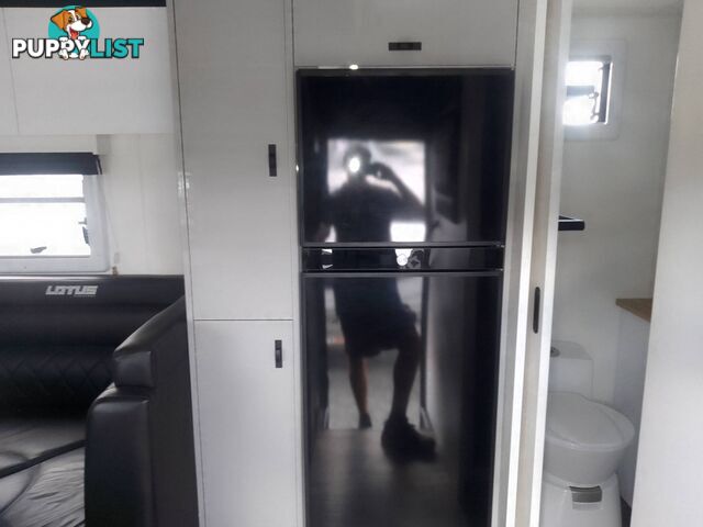 USED 2022 LOTUS FREELANDER 216 OFFROAD CARAVAN WITH WISHBONE, COIL & SHOCK ABSORBER SUSPENSION.