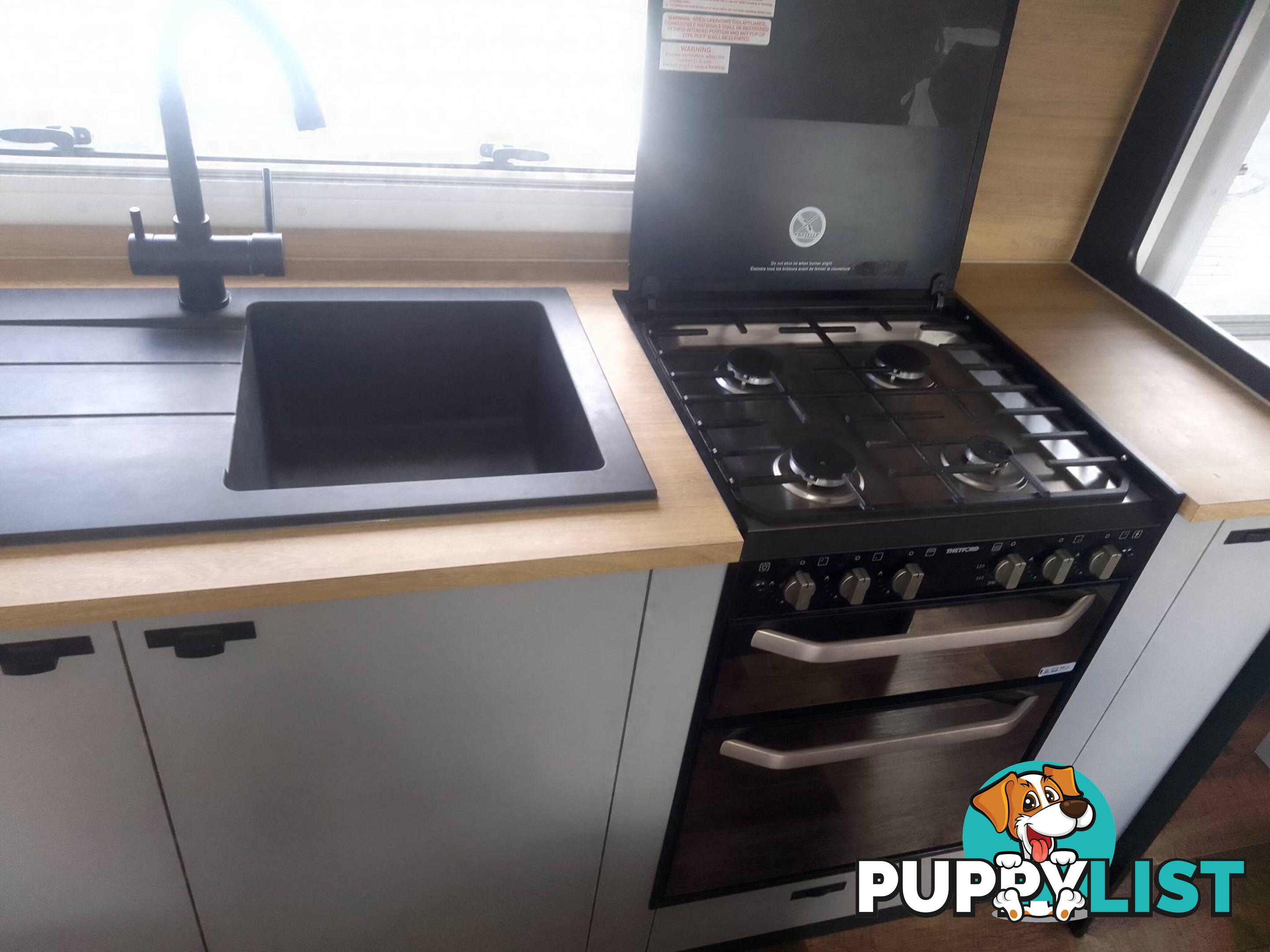 USED 2022 LOTUS FREELANDER 216 OFFROAD CARAVAN WITH WISHBONE, COIL & SHOCK ABSORBER SUSPENSION.