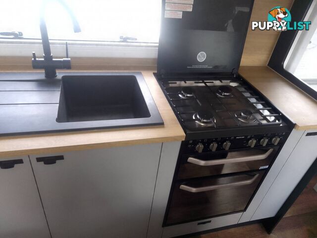 USED 2022 LOTUS FREELANDER 216 OFFROAD CARAVAN WITH WISHBONE, COIL & SHOCK ABSORBER SUSPENSION.