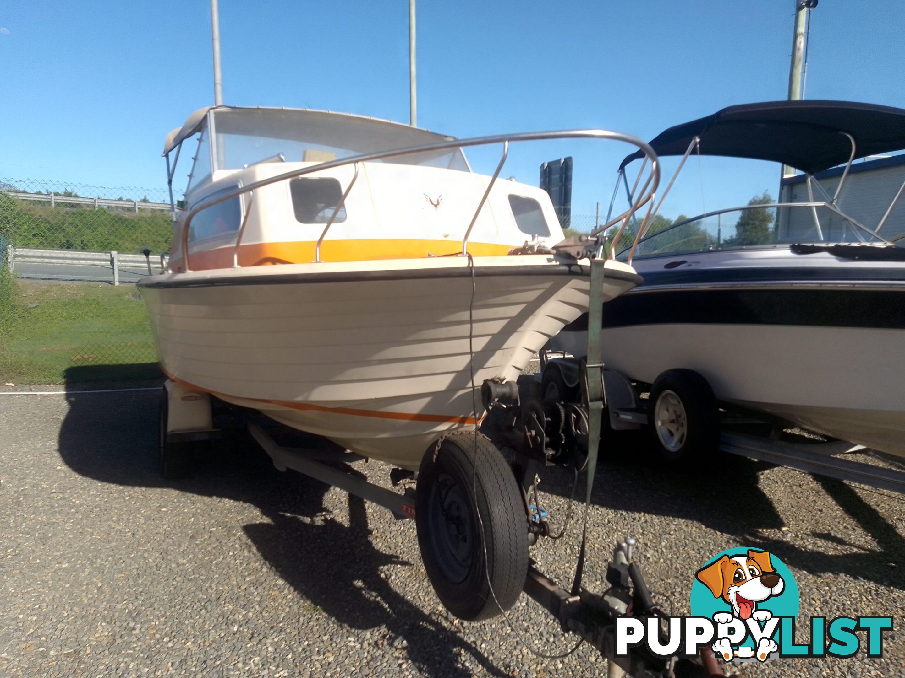 USED CRUISECRAFT REGAL 166 HALF CABIN 16.6FT WITH 140HP 4 STROKE SUZUKI OUTBOARD AND AUX 4HP MERCURY 4 STROKE OUTBOARD ON TINKA TRAILER