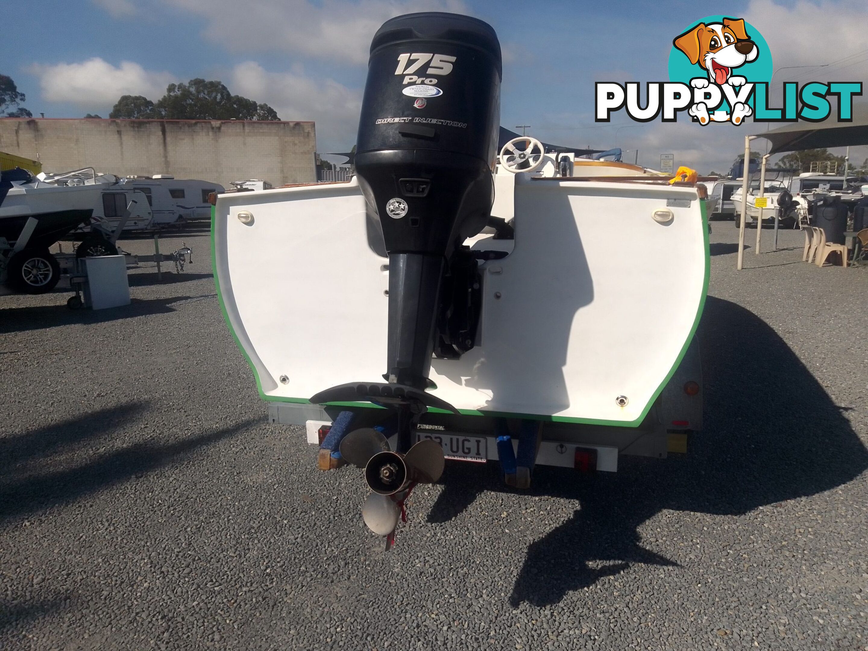 USED 2015 CUSTOM 7.00M COMPOSITE LAUNCH ON A DUAL AXLE TRAILER WITH A 2015 MODEL MERCURY OPTIMAX 175HP OUTBOARD.