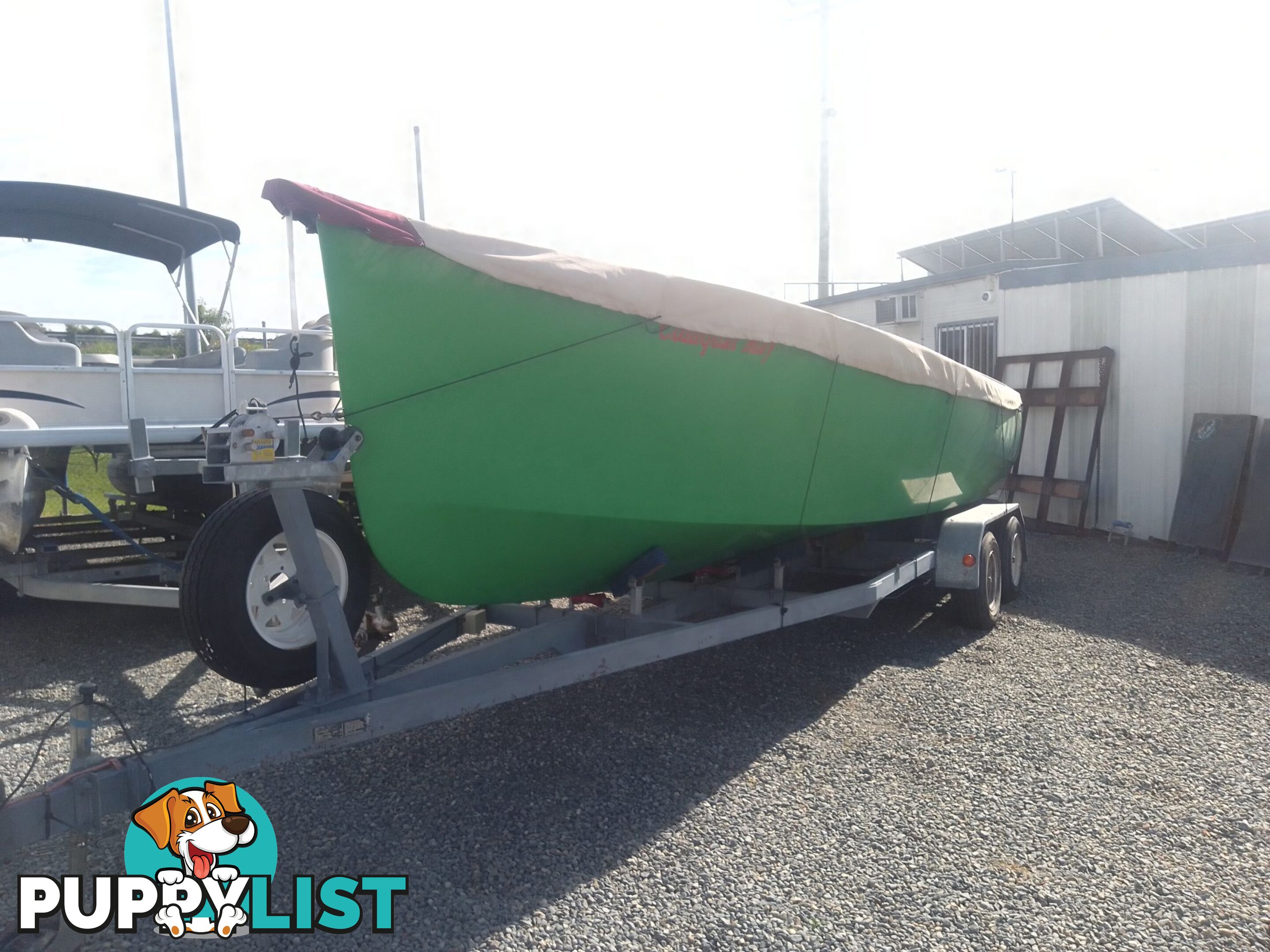 USED 2015 CUSTOM 7.00M COMPOSITE LAUNCH ON A DUAL AXLE TRAILER WITH A 2015 MODEL MERCURY OPTIMAX 175HP OUTBOARD.