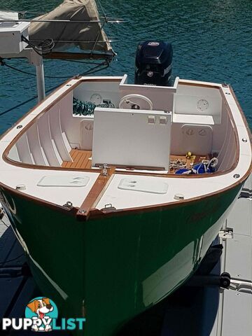 USED 2015 CUSTOM 7.00M COMPOSITE LAUNCH ON A DUAL AXLE TRAILER WITH A 2015 MODEL MERCURY OPTIMAX 175HP OUTBOARD.