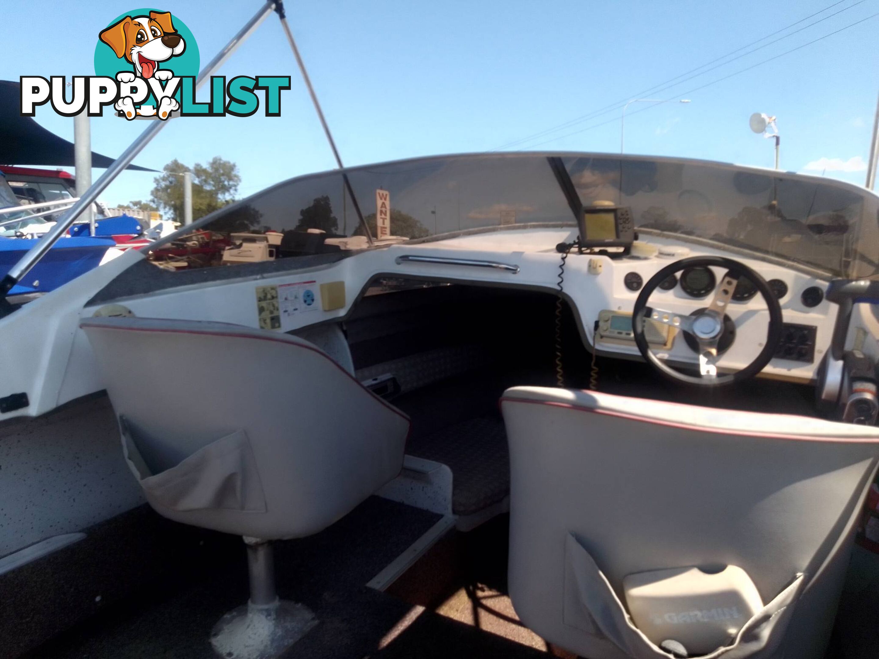 HAINES SIGNATURE 550LE HALF CABIN 115HP EVINRUDE 2 STROKE AND TRAILER