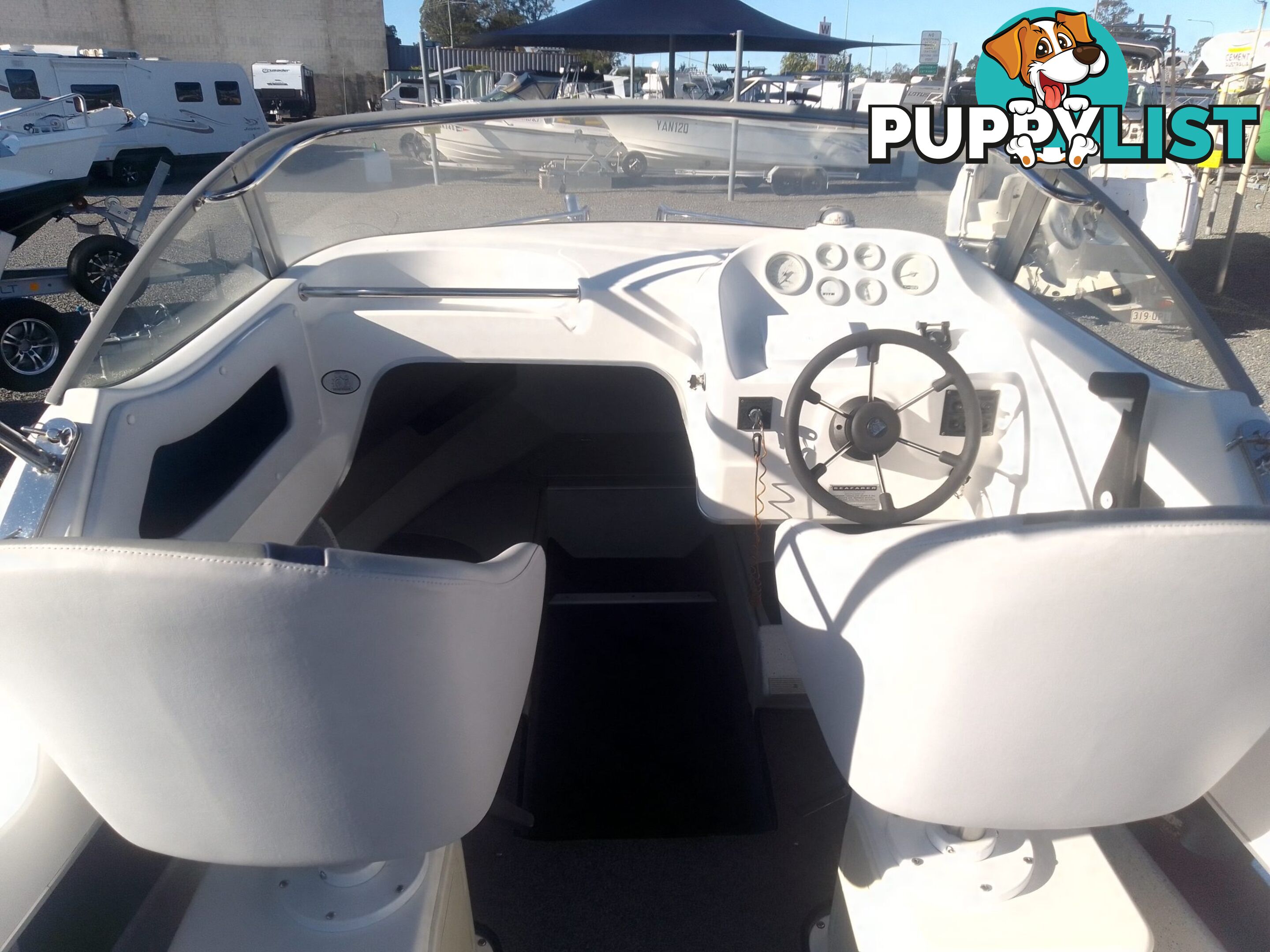 USED 2002 SEAFARER VIKING 5.5M CUDDY CABIN WITH A 2002 115HP EVINRUDE OUTBOARD ON A 2002 TINKA SEAFARER SINGLE AXLE TRAILER