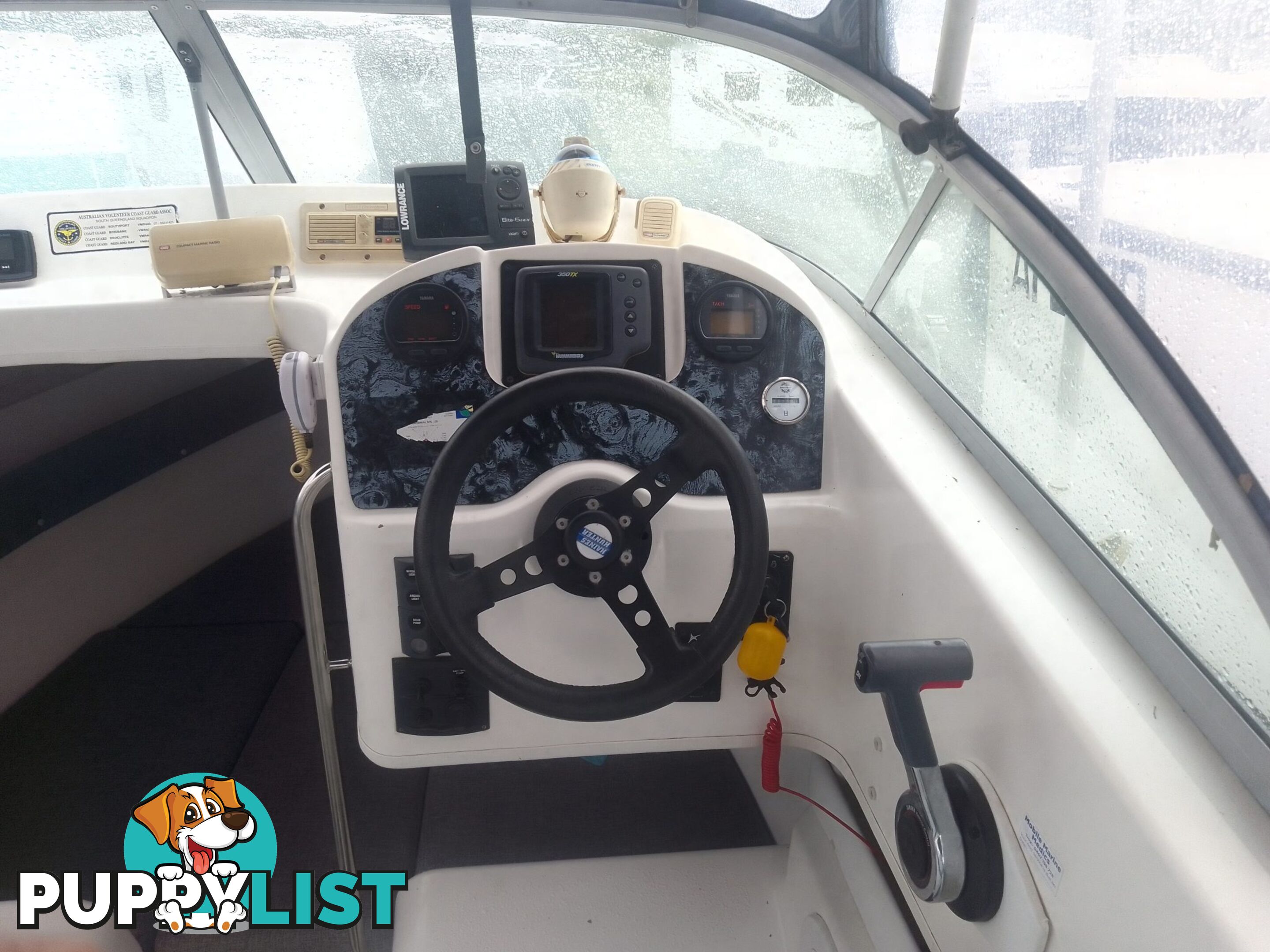 USED 2001 HAINES HUNTER 530 HALF CABIN ON A 2002 TINKA MULTI ROLLER TRAILER WITH A 115HP YAMAHA OUTBOARD.