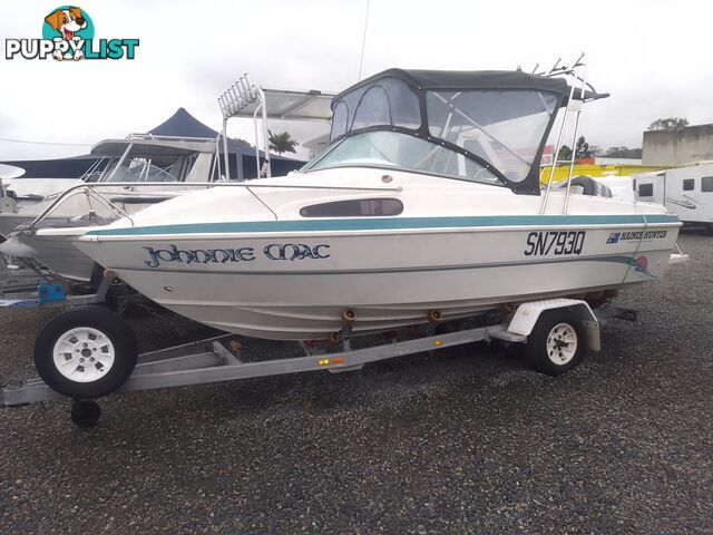 USED 2001 HAINES HUNTER 530 HALF CABIN ON A 2002 TINKA MULTI ROLLER TRAILER WITH A 115HP YAMAHA OUTBOARD.