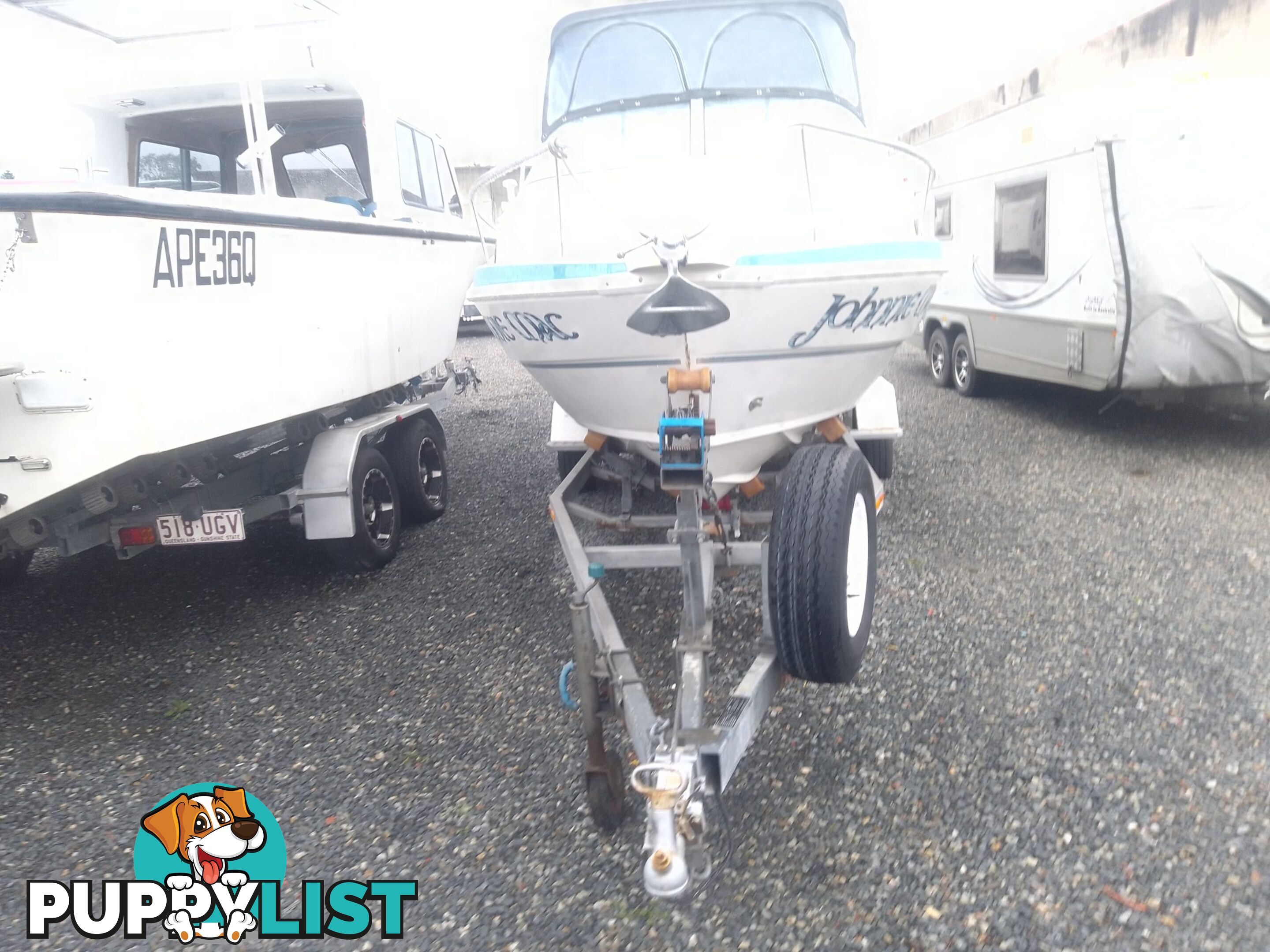 USED 2001 HAINES HUNTER 530 HALF CABIN ON A 2002 TINKA MULTI ROLLER TRAILER WITH A 115HP YAMAHA OUTBOARD.