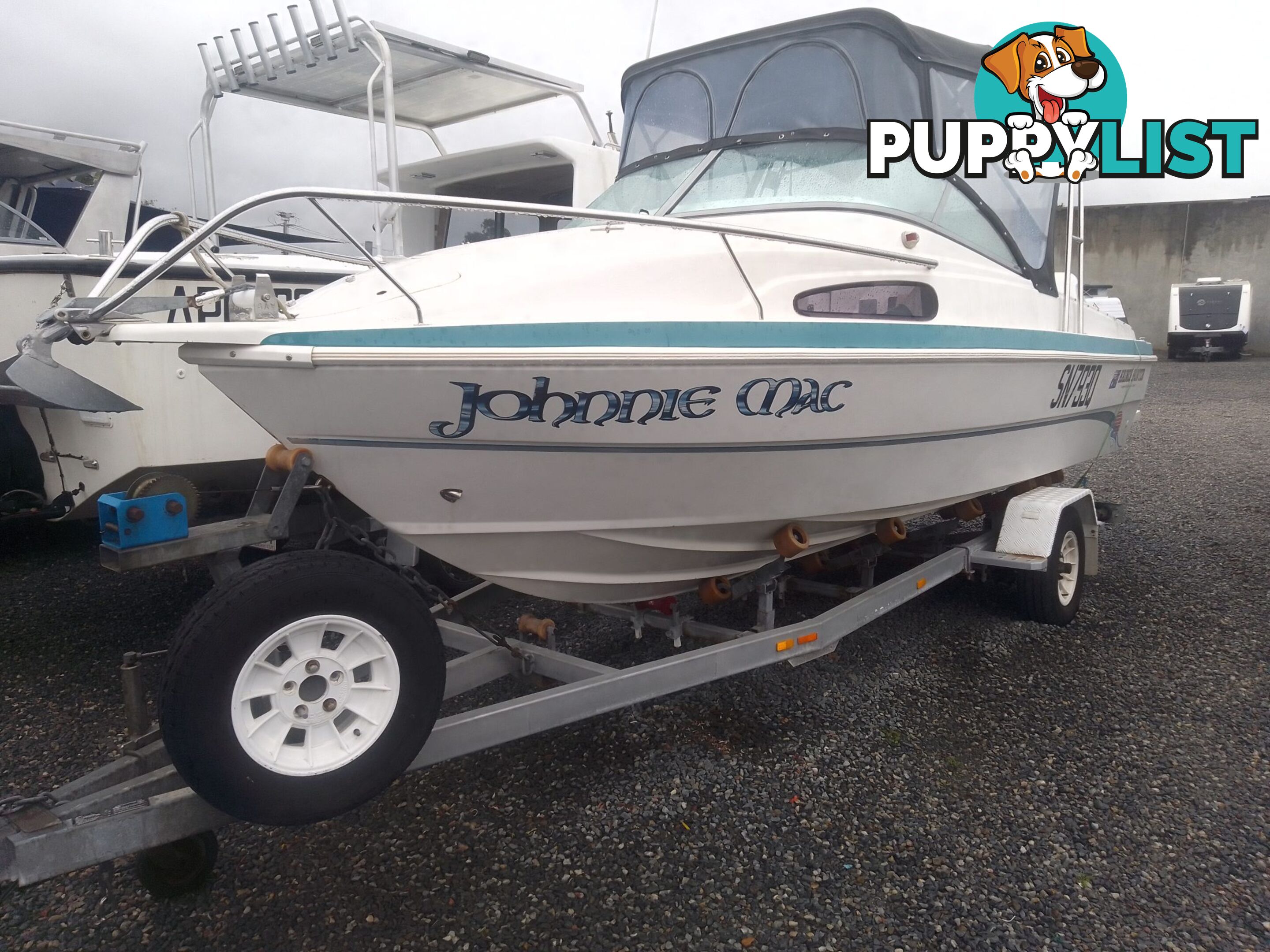 USED 2001 HAINES HUNTER 530 HALF CABIN ON A 2002 TINKA MULTI ROLLER TRAILER WITH A 115HP YAMAHA OUTBOARD.