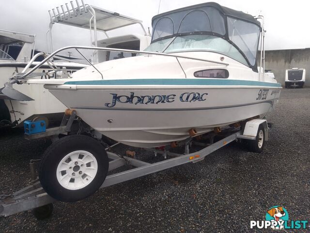 USED 2001 HAINES HUNTER 530 HALF CABIN ON A 2002 TINKA MULTI ROLLER TRAILER WITH A 115HP YAMAHA OUTBOARD.