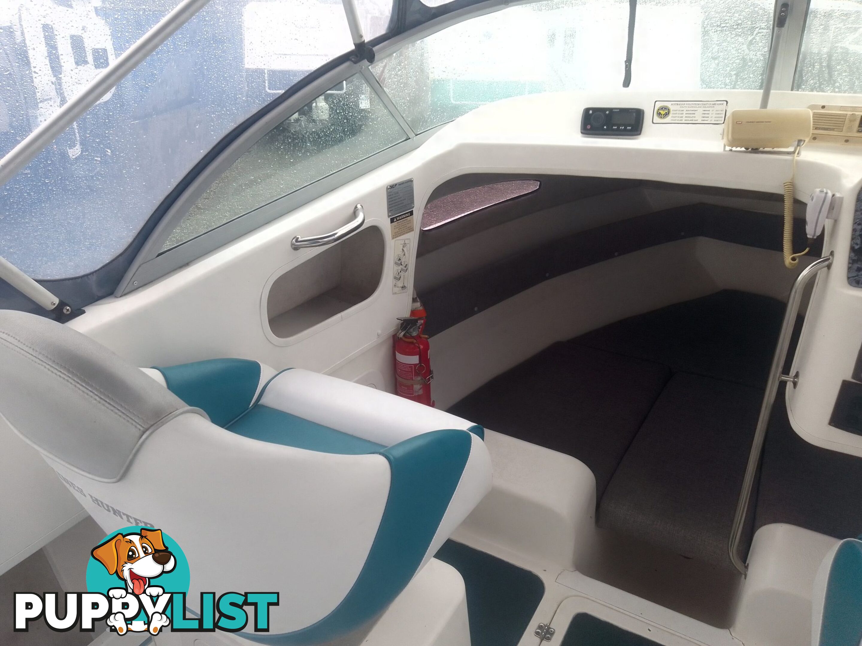 USED 2001 HAINES HUNTER 530 HALF CABIN ON A 2002 TINKA MULTI ROLLER TRAILER WITH A 115HP YAMAHA OUTBOARD.