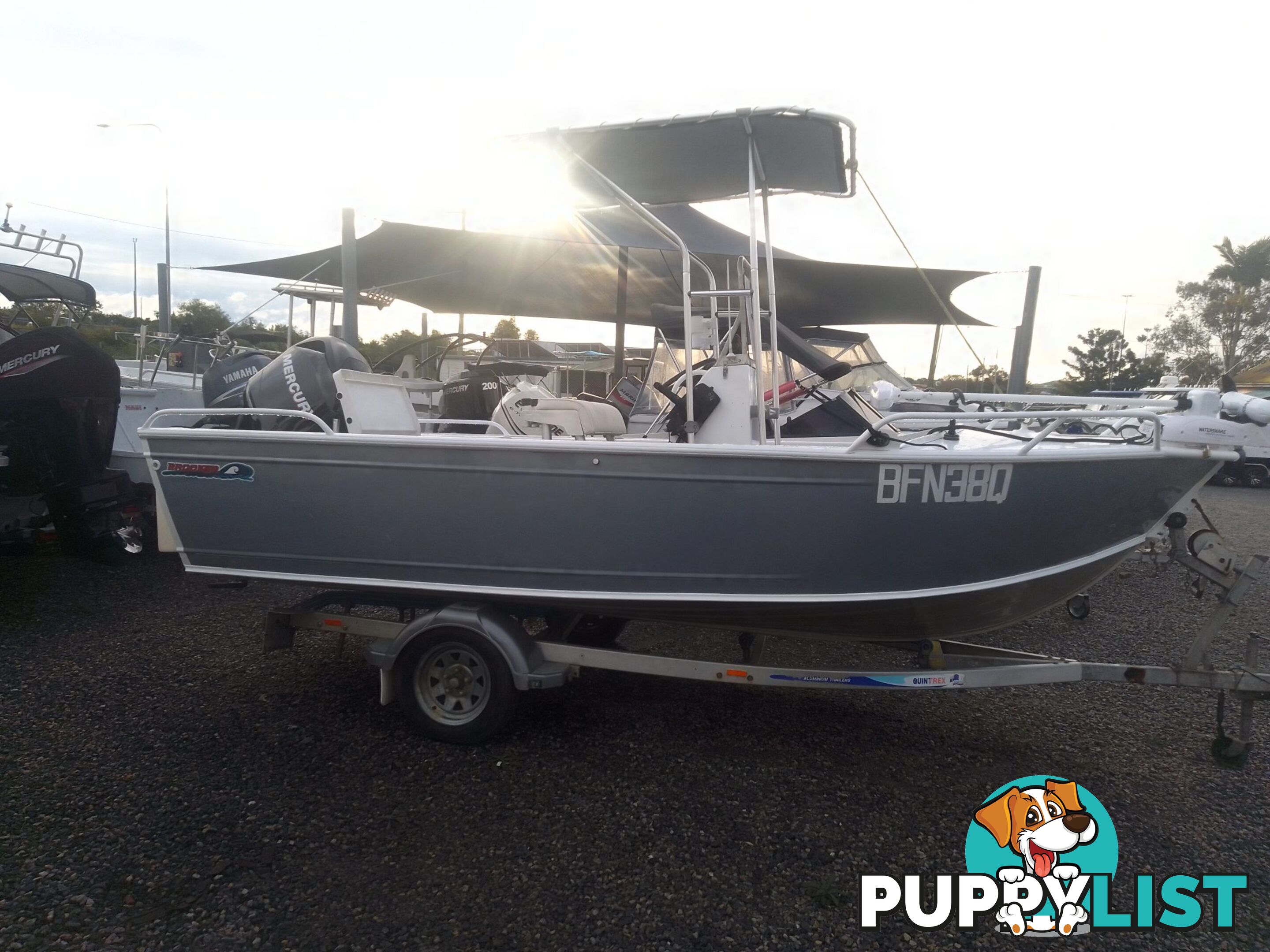 USED 2011 BROOKER DISCOVERY 5M CENTRE CONSOLE WITH A 2007 75HP MERCURY EFI 4 STROKE OUTBOARD ON A 2002 QUINTREX SINGLE AXLE TRAILER.