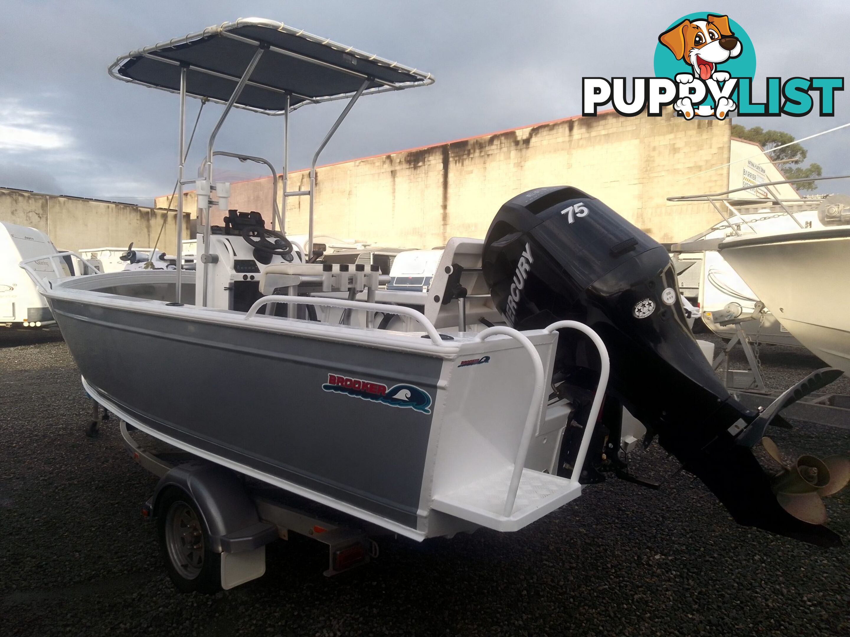 USED 2011 BROOKER DISCOVERY 5M CENTRE CONSOLE WITH A 2007 75HP MERCURY EFI 4 STROKE OUTBOARD ON A 2002 QUINTREX SINGLE AXLE TRAILER.
